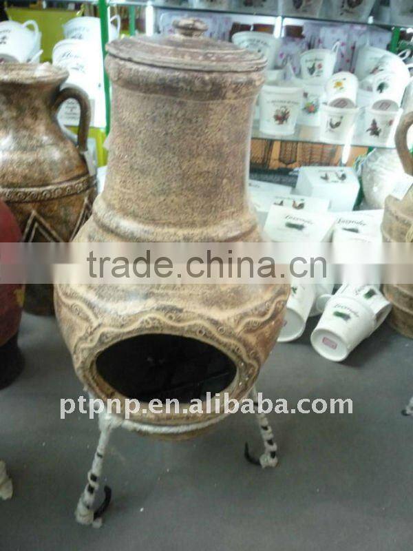 Clay chimney with metal stand, fire shelf and lid for garden decoration