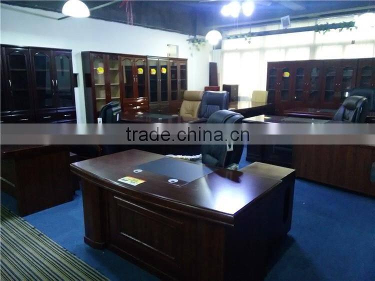 Black tufted reception desk made with tempered glass