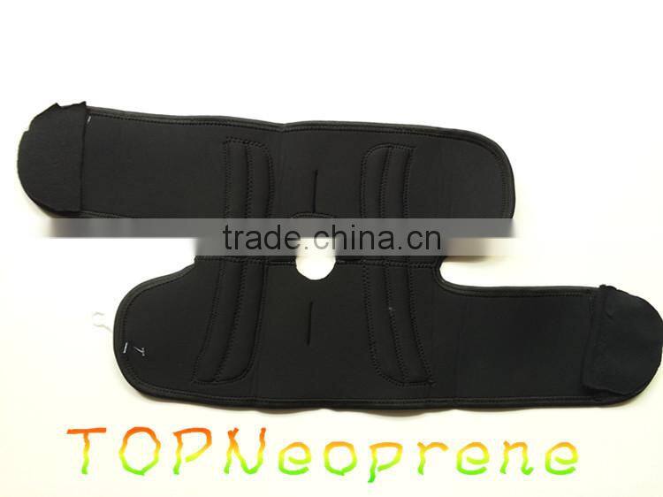 Compression neoprene knee support with adjustable spring support