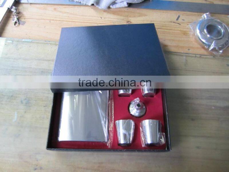 9oz and 18oz hip flask add to four cups and a Funnel in gift set box