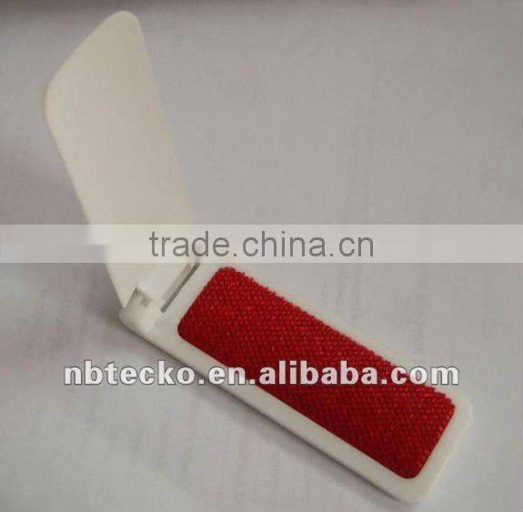 Plastic travelling lint brush