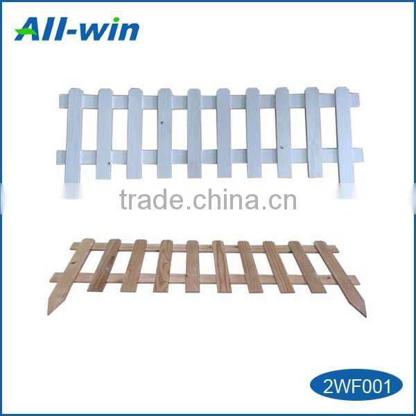 wooden garden fence, timber picket fence with extended spiked end sections