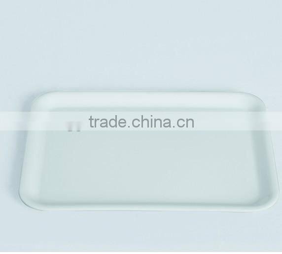 White plastic serving tray