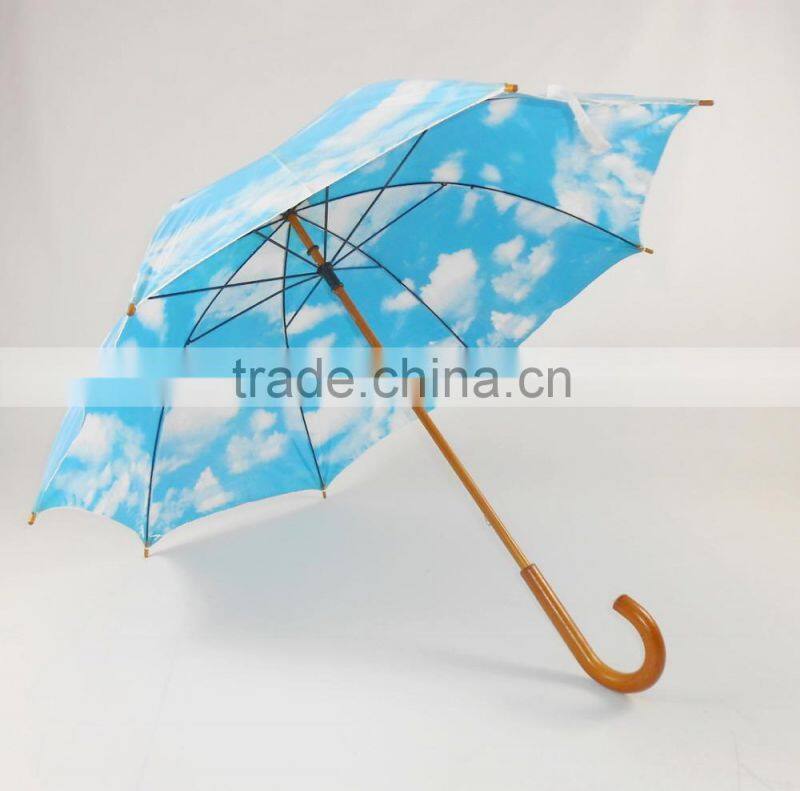 sky blue and white cloud umbrella wooden umbrella blue sky