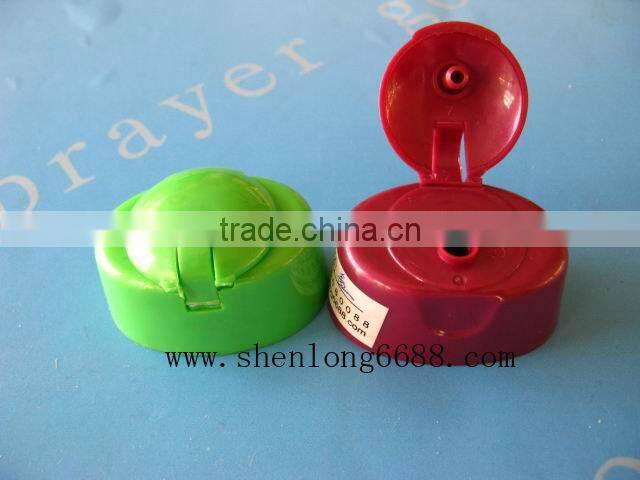 Plastic flip top cap for shampoo bottles