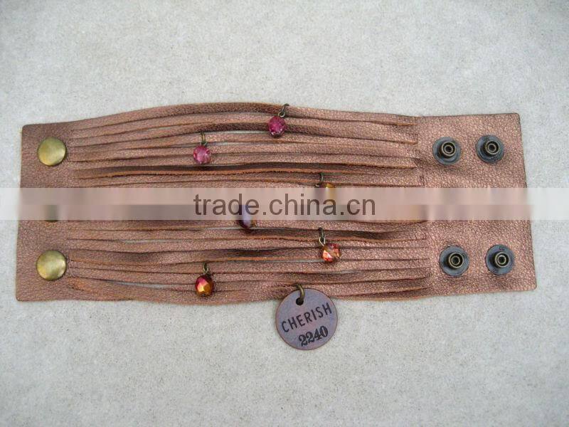 sliced leather bracelet, wide Leather Cuff - Charms Bracelet, Multi Strap Bracelet with peace and gun charms