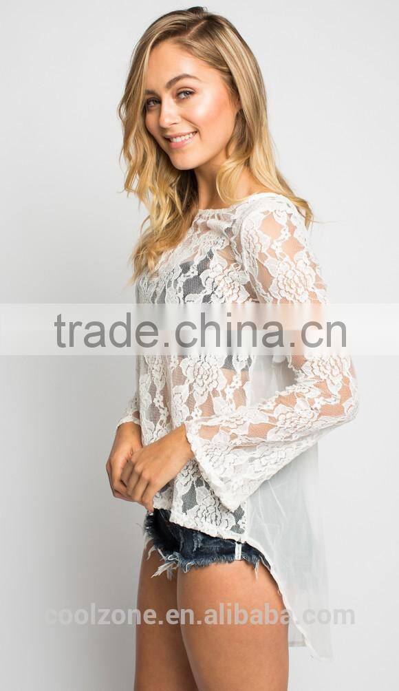 Beautiful lace front long sleeve lower back lace blouse
