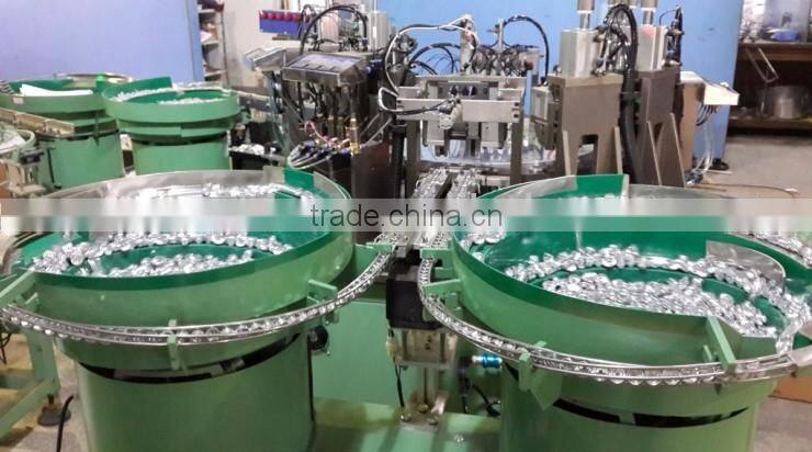 cosmetic plastic dispenser part assembly and test machine