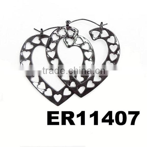 women heart shaped black metal earrings