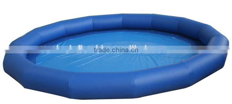 inflatable swimming pool floating on water deployed