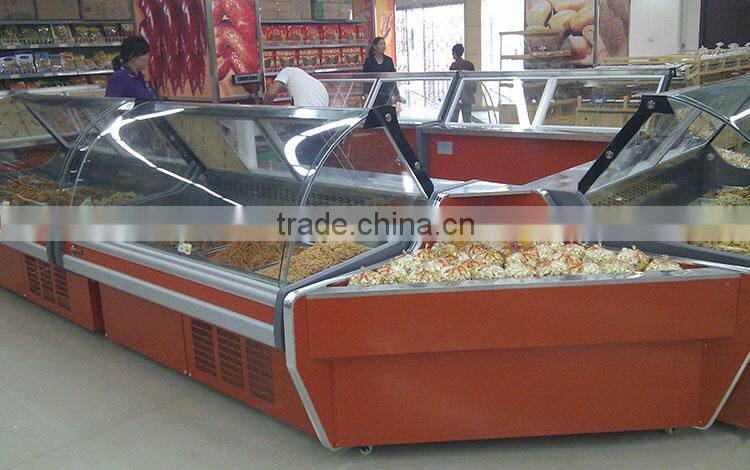 supermarket meat and fish display freezer/refrigerator with curved glass door