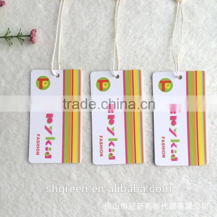 Vogue spot UV paper hangtag with nylon ribbon