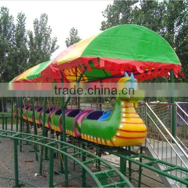 Kids large amusement rides mini roller coaster , sliding dragon / green worm mini roller coaster rides hot sale