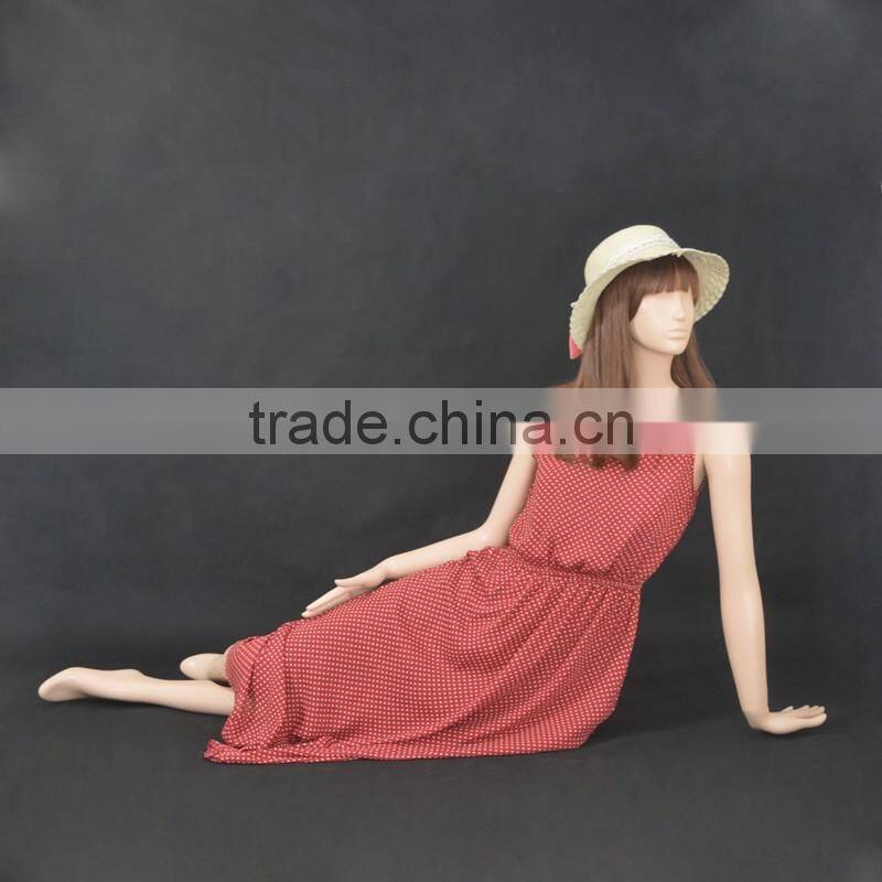 Abstract sex female sitting mannequin for window display