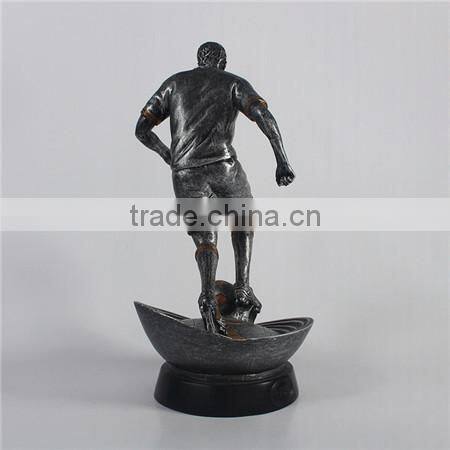 Resin soccer player trophy