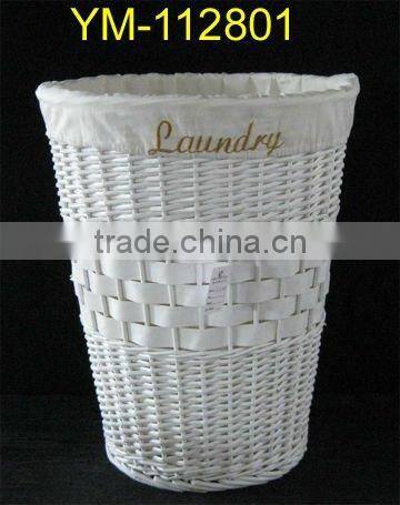 large round white wicker laundry basket