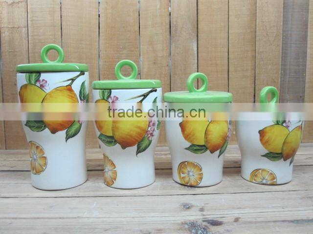 Home used ceramic storage jars with lemon decal