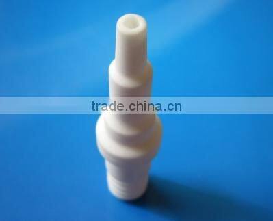 Spark plug insulator