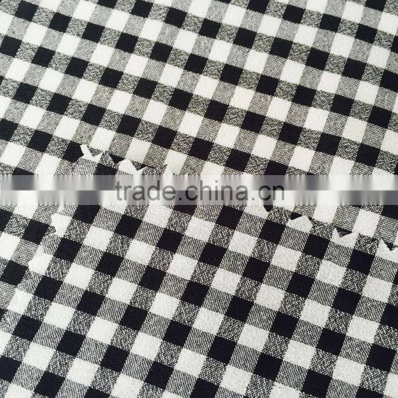 Chinese manufacture supply high quality cationic false twist fabric/printed fabric for dress,garment,etc