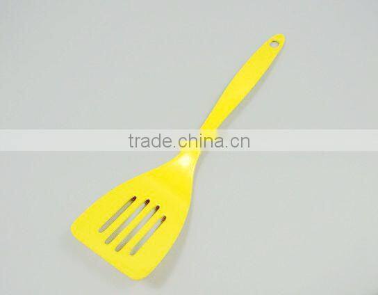 Yellow melamine spoon kitchenware cookware