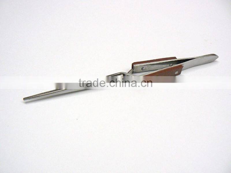 TWEEZERS CROSS LOCKING