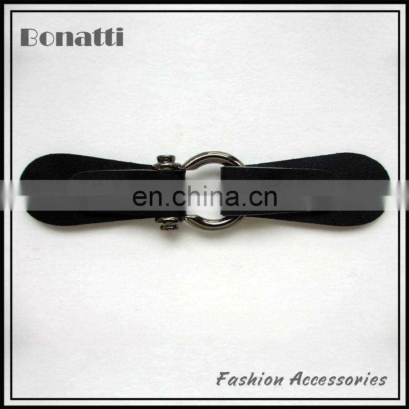 leather toggle button with golden metal buckle