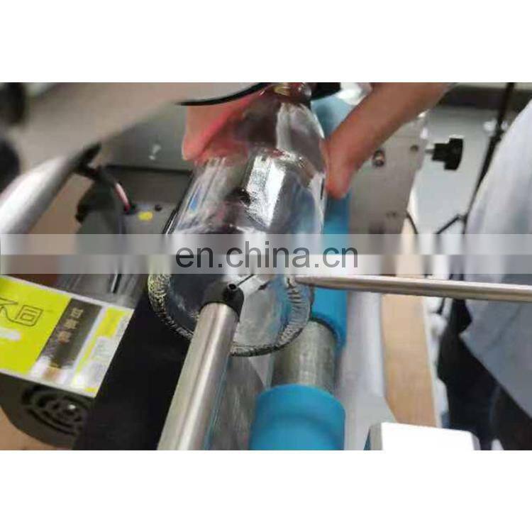 semi-automatic labeling machine can label with  a whole circle  and  Double Side and Positioning to label
