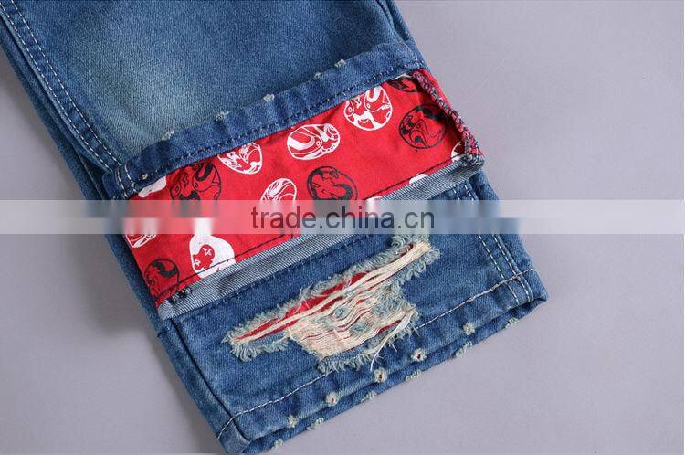 2015 Ripped Slim100% Cotton Jeans top fashion men designer jeans stock men stone washing hole blue jean trouser with opera face