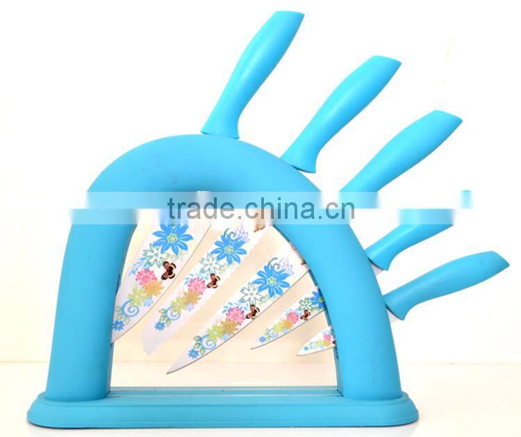 toy butterfly knife with flower printing in block