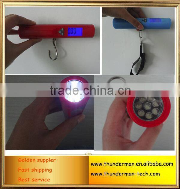 Portable digital luggage weighing scale with flashlight function
