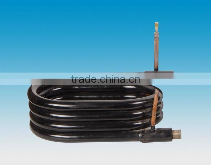 Titanium coaxial coil heat exchanger for vessel