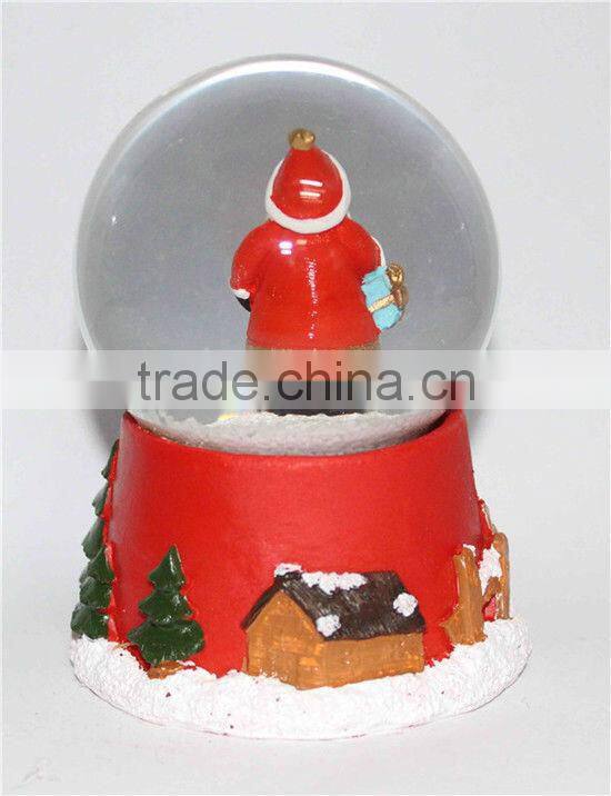 Resin Christmas lighted snow globe