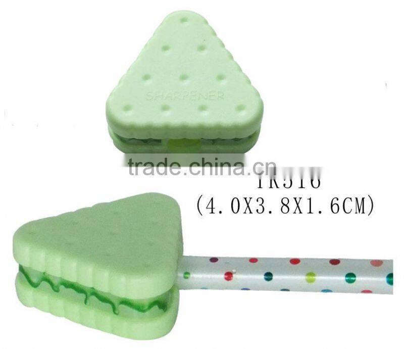 Cute triangular biscuit shape mini plastic pencil sharpener