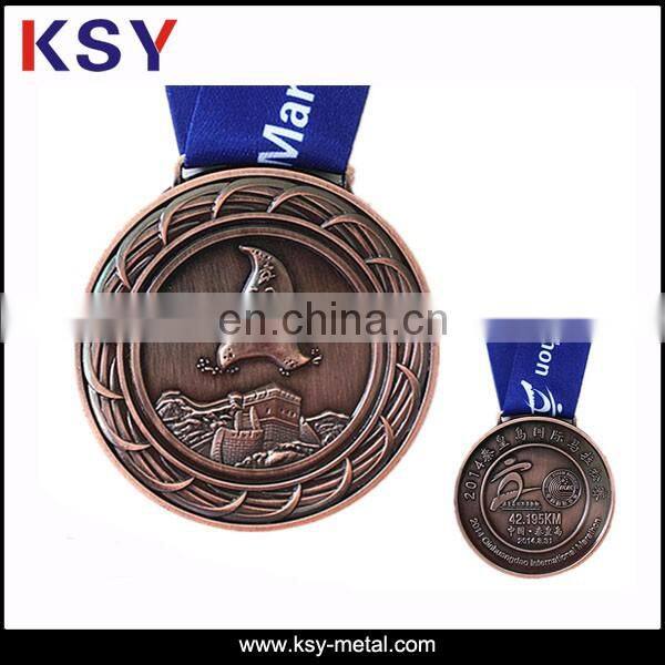 Nickle free metal medal with brass plating