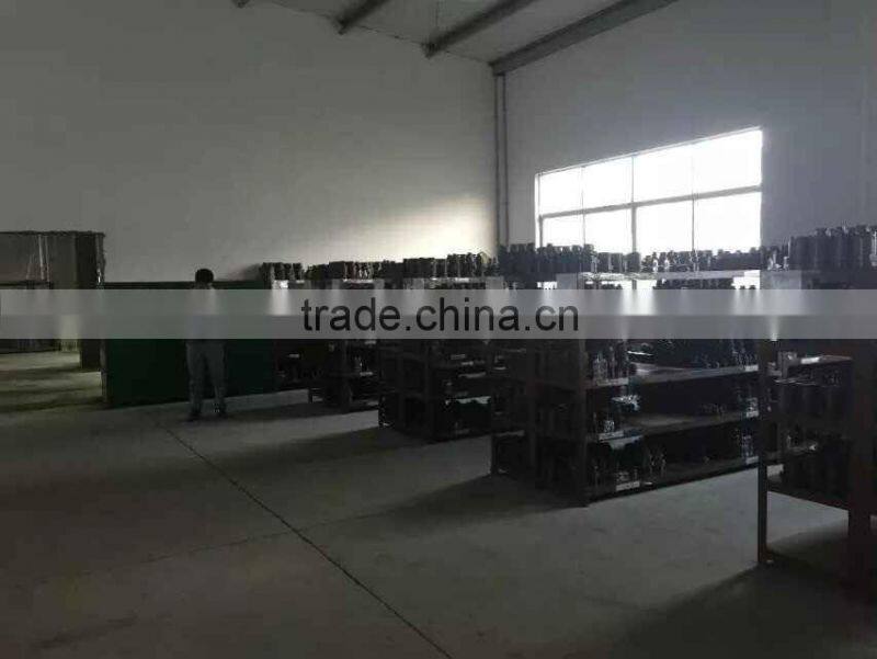 glass perfume bottle with the flower shape cap