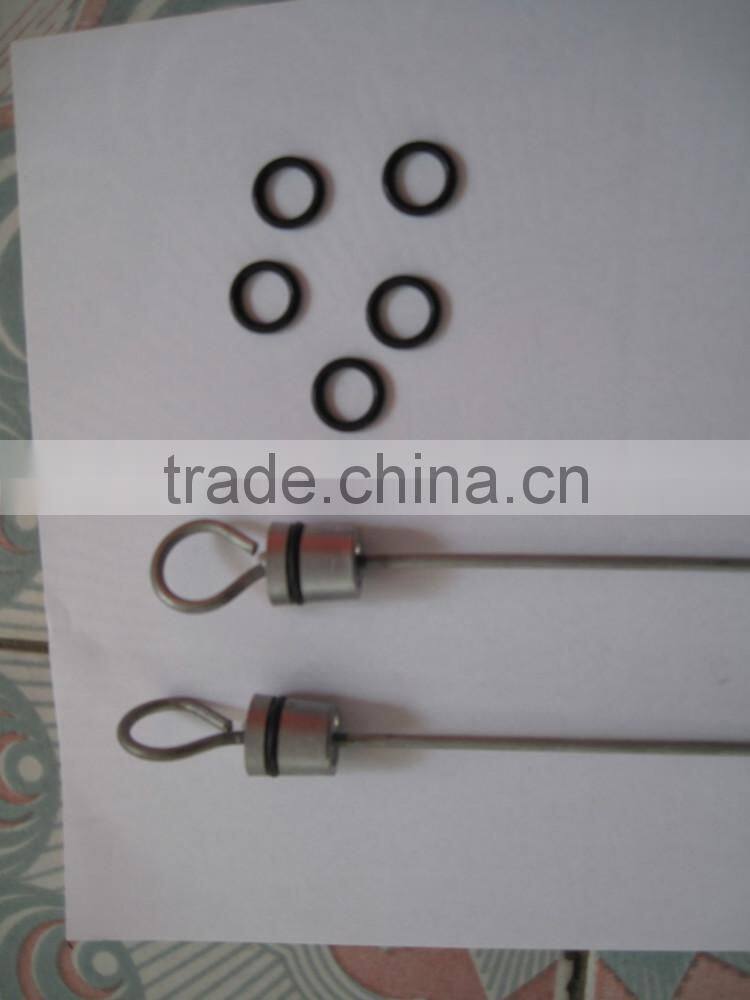 Farm tractor diesel engine oil indicating stick