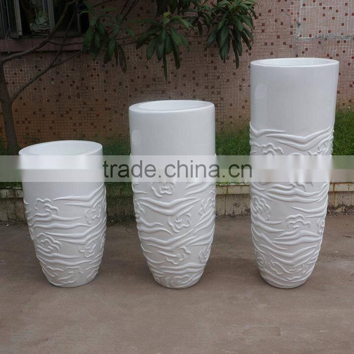 Modern white fiberglass planter