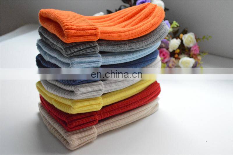 Hot China Supplier Knitted Kids Caps with Raccoon Fur Pompoms Christmas Hats