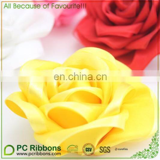 White satin ribbon rose flower