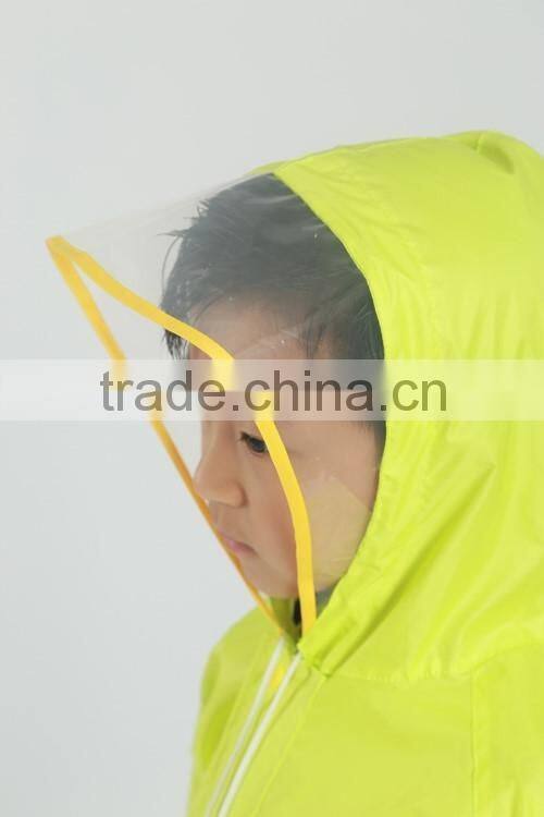 school kids use school bag raincoat