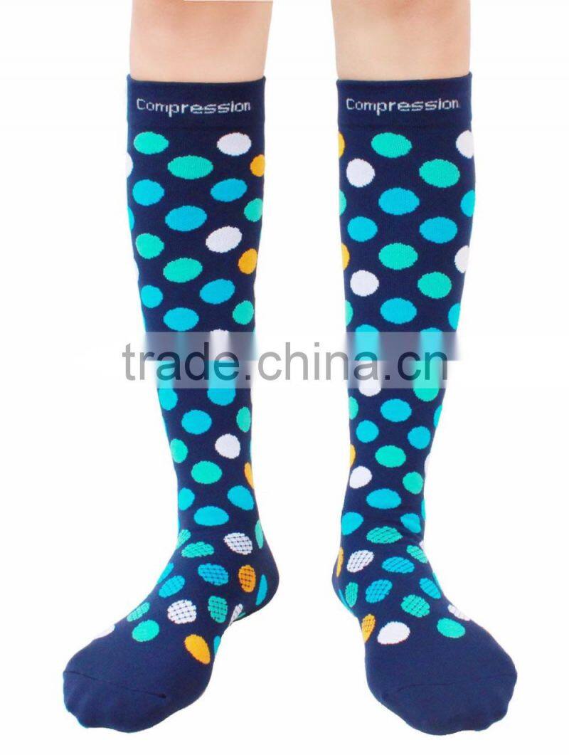 Compression Socks with polka dots made of nylon and spandex