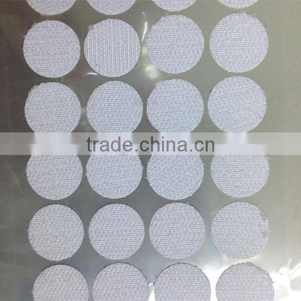 Adhesive industrial hook and loop dots