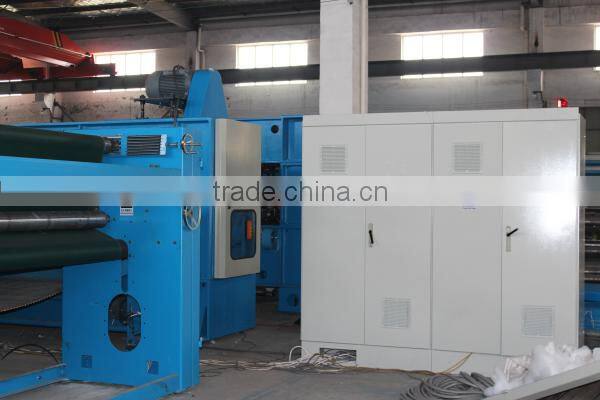 Cross lapping machine, cross lapper machine, nonwoven machine cross lapper
