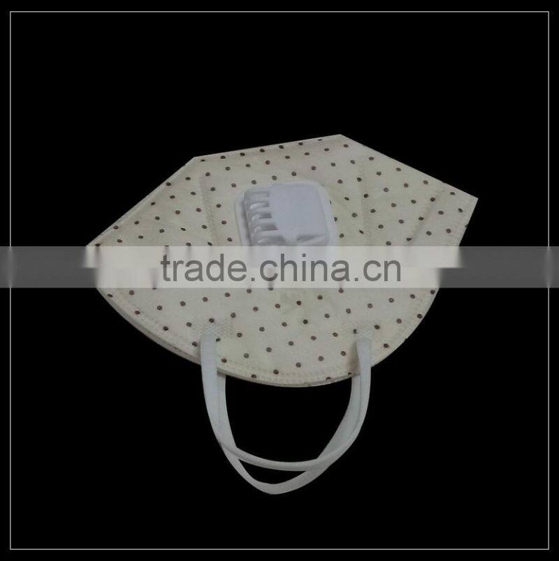 Yellow spunlace nonwoven fabric protective face mask with valve