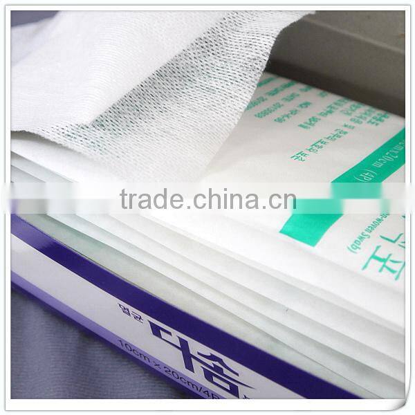 surgical ressing nonwoven pads