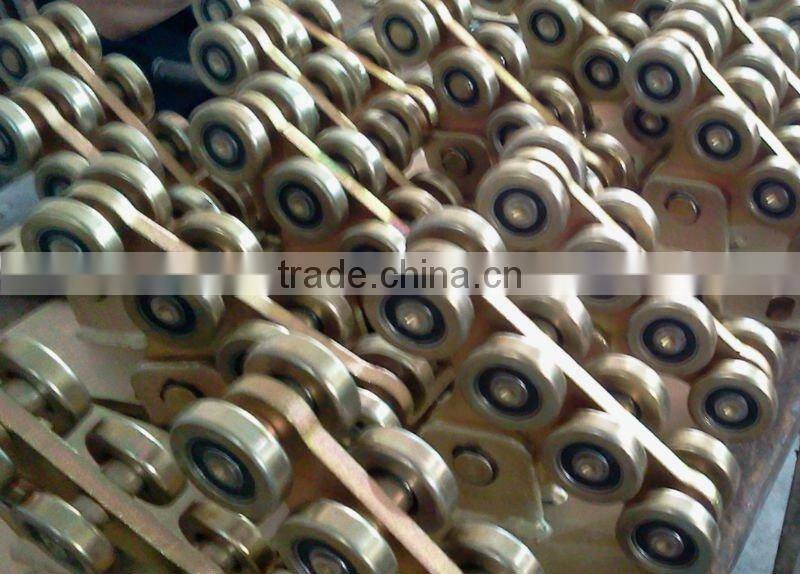 automatic carriage gate rollers