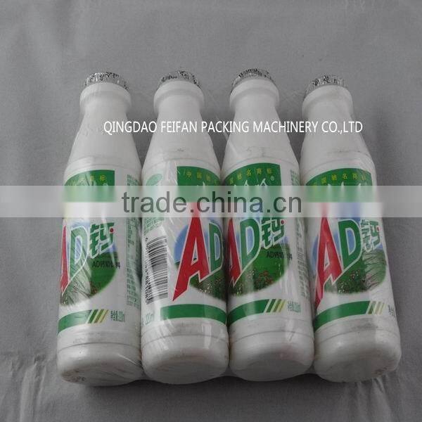 Omron PLC Control Automatic Yakult Bottles Heat Shrink Packing Machine