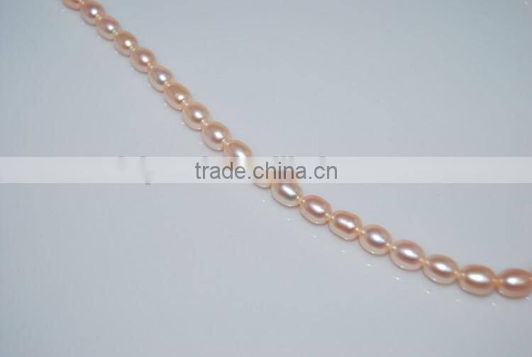 new 8-9mm pink rice shape freshwater pearl strand wholesale