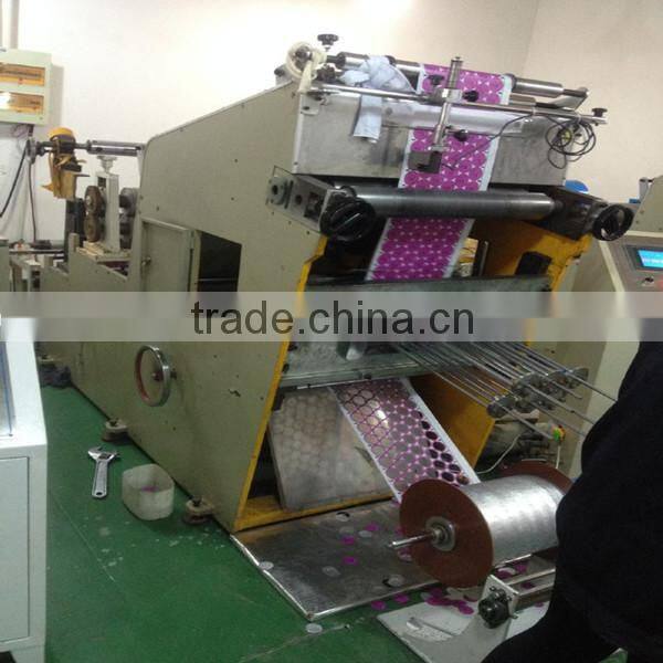 Pre cut paper lid punching machine