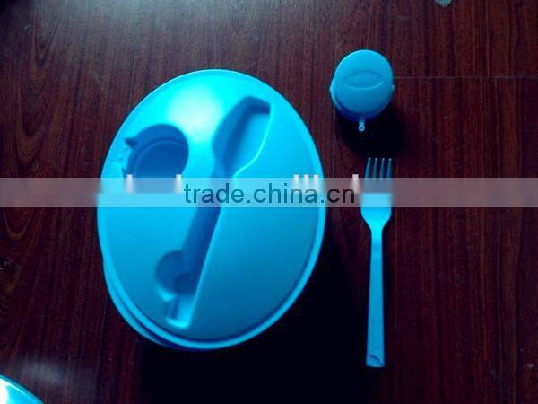 plastic round salad bowl with fork
